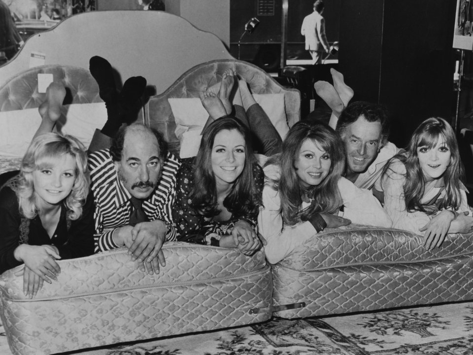  Brian Rix starred alongside Joanna Lumley (fourth from right) in the 1974 film "Don't Just Lie There, Say Something."