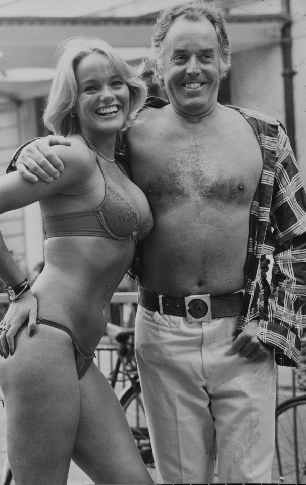  A cheerful Brian pictured with actress Sally Harrison in 1976