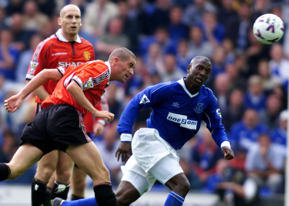 Roy Keane and Jaap Stam up against Former Everton striker Kevin Campbell