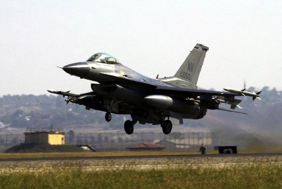 A U.S. Air Force F-16, loaded with bombs and missiles, takes off from Turkey's Incirlik air base in 2001