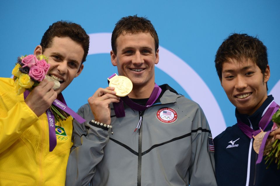 Lochte (centre) is alleged to have been invited to the party by Brazilian swimmer Thiago Pereira (left). The pair are seen here on the podium at the London 2012 Olympics