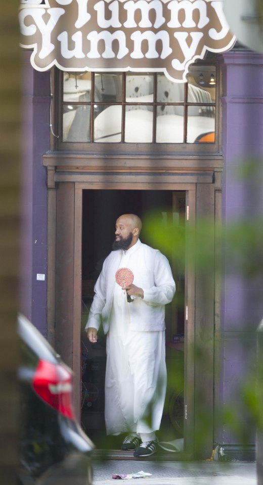  Abu Izzadeen pictured outside one of three halal sweet shops in the East London