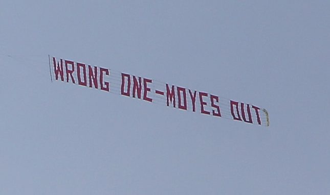 A plane flying a banner reading wrong one - Moyes out flies over Old Trafford during the former Everton managers Manchester United reign