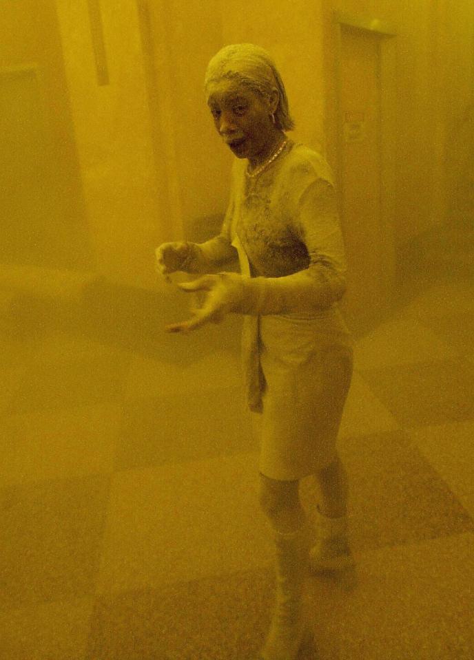  Marcy Borders was pictured covered in dust in the aftermath of the September 11 attacks