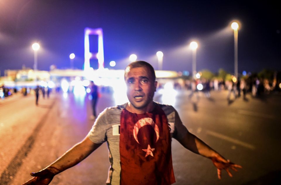  A man covered in blood was just one of the thousands who took to the streets against the military coup in July