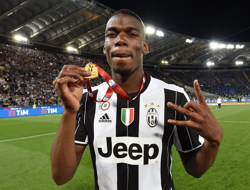  Pogba celebrates victory against AC Milan but has now returned to England