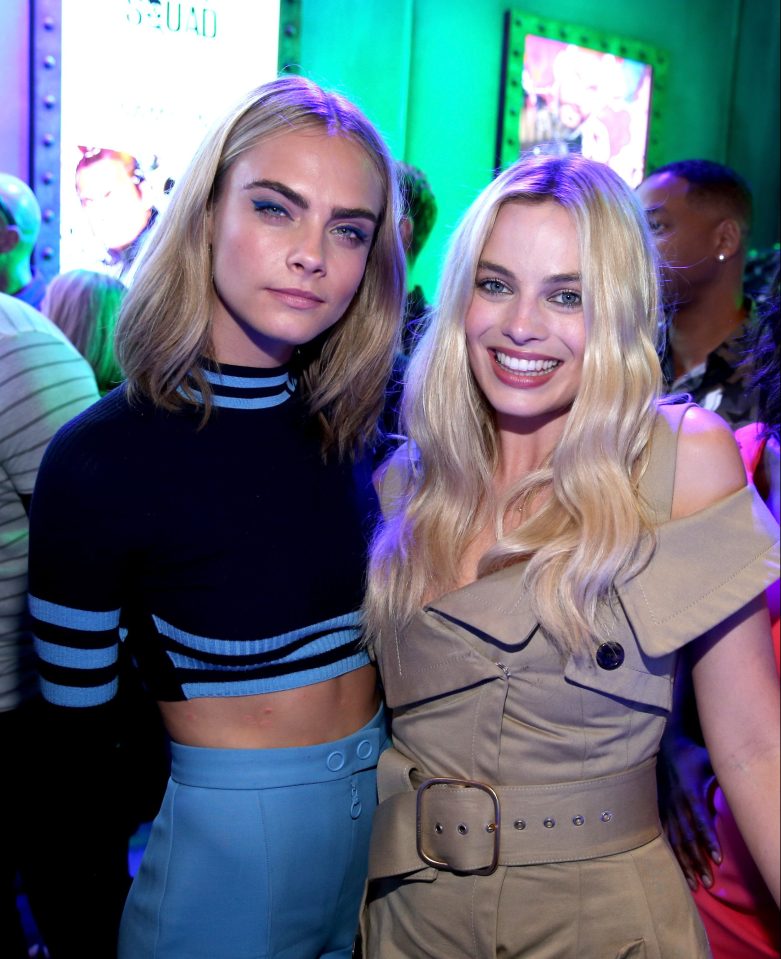  Cara is vying for attention with co-star Margot Robbie, who plays Harley Quinn in the movie