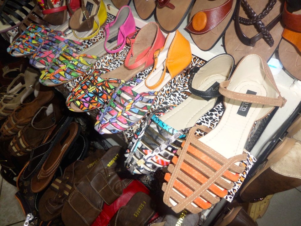  Handmade leather sandals on display at market