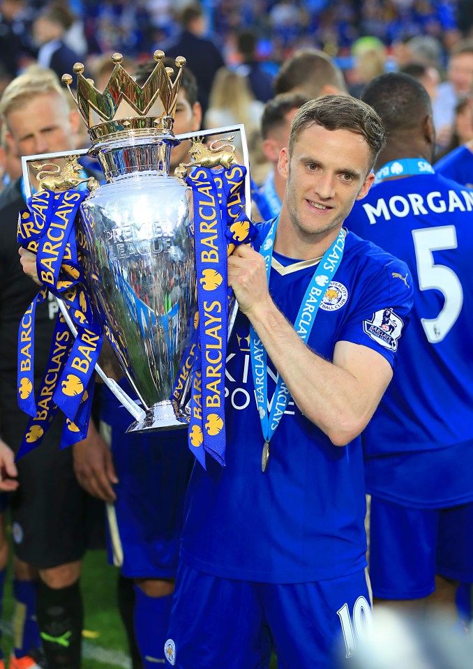  Andy King lifting the Premier League trophy