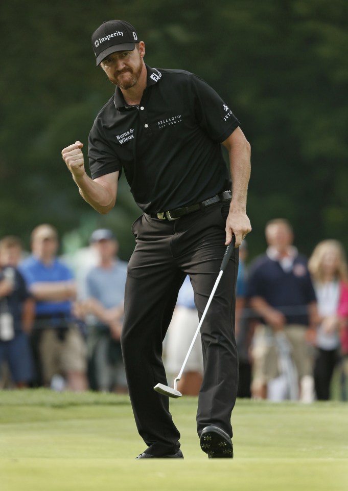  Jimmy Walker reacts to sinking a monster birdie putt on 11