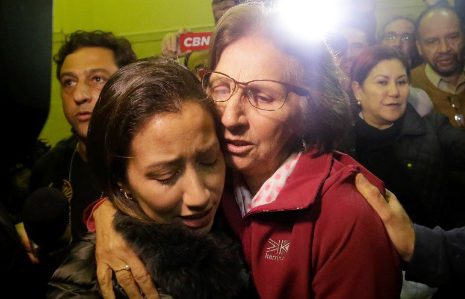  Safe at last . . . Aparecida Schunck was reunited with relieved family members after being held hostage