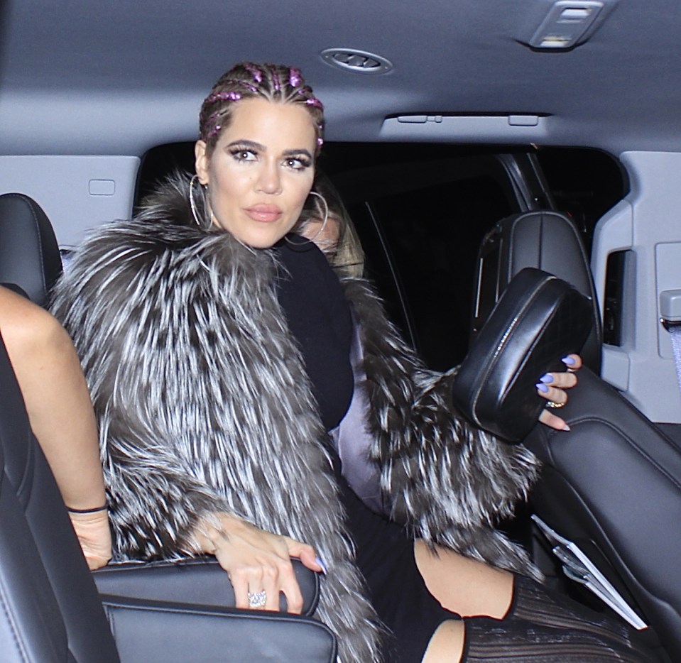  Khloe went for full-on glamour with a fur coat and thigh-high boots