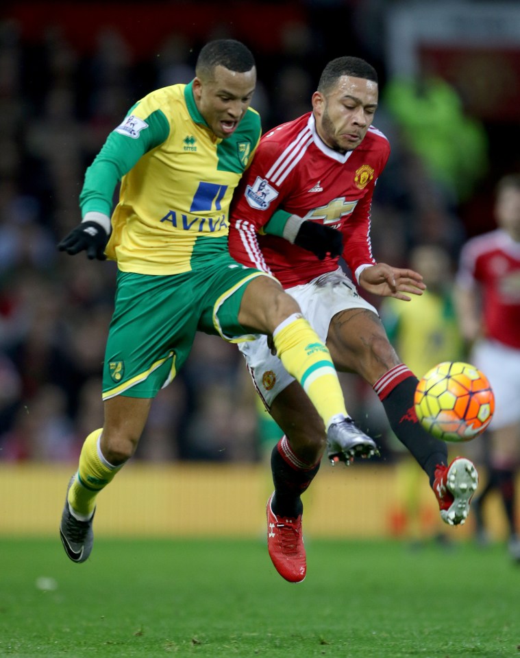 Norwich's Martin Olsson, left, is the subject of interest from West Ham