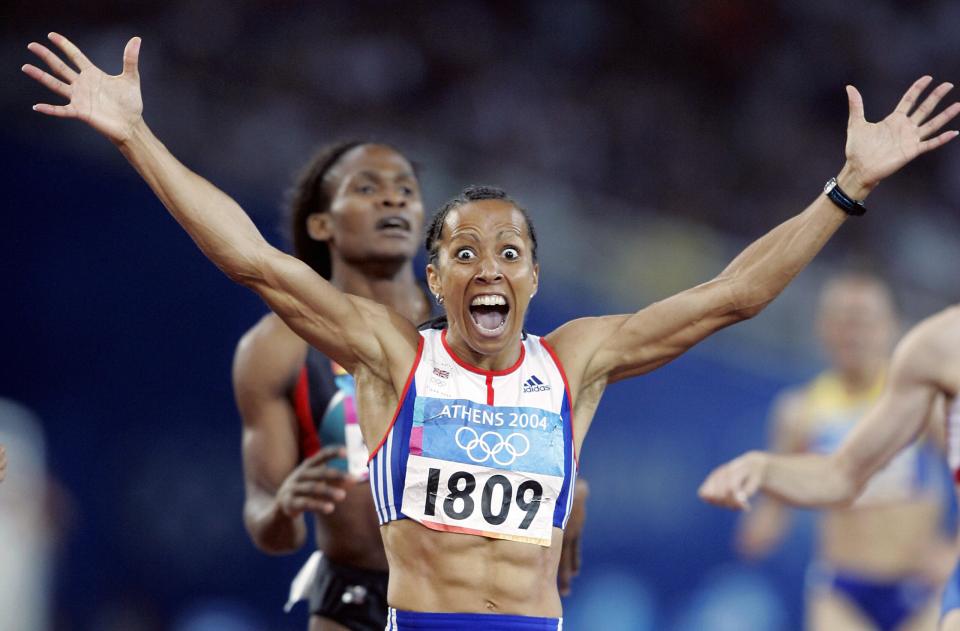 Helly Holmes celebrates winning 800-metre gold at the Athens Olympics