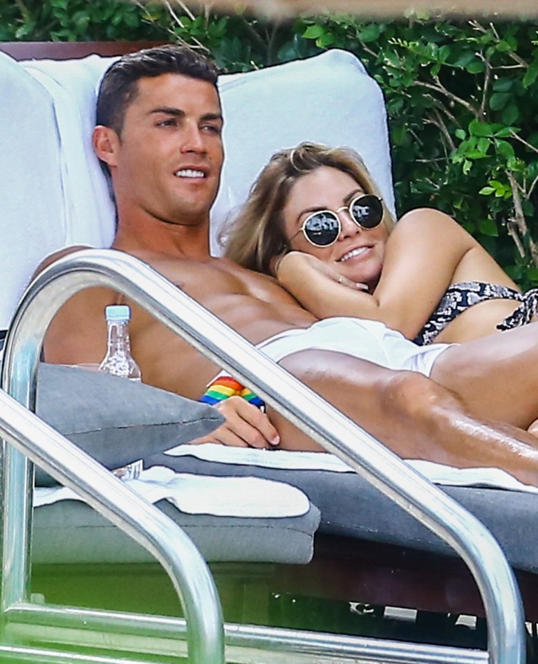  Ronaldo and Cassandra Davis cuddle up next to the pool