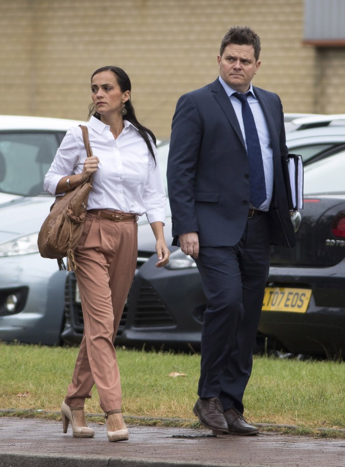  Happy couple ... the pair, pictured her before a court appearance, had the perfect life before their lives fell apart