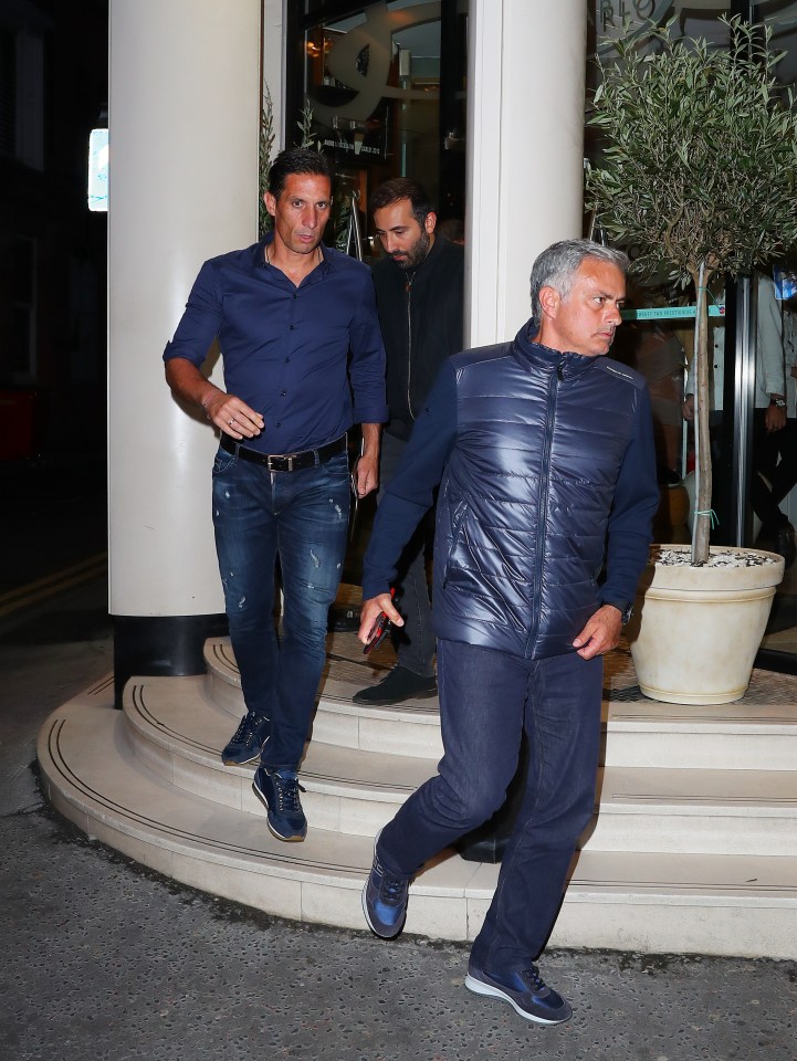  Jose Mourinho steps out of San Carlo alongside his Manchester United backroom staff