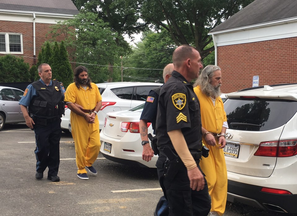 Daniel Stolzfus (left) and Lee Kaplan are marched into court today