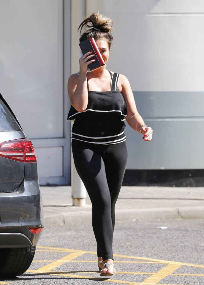  Lauren Goodger hid her face from the paparazzi on a recent outing