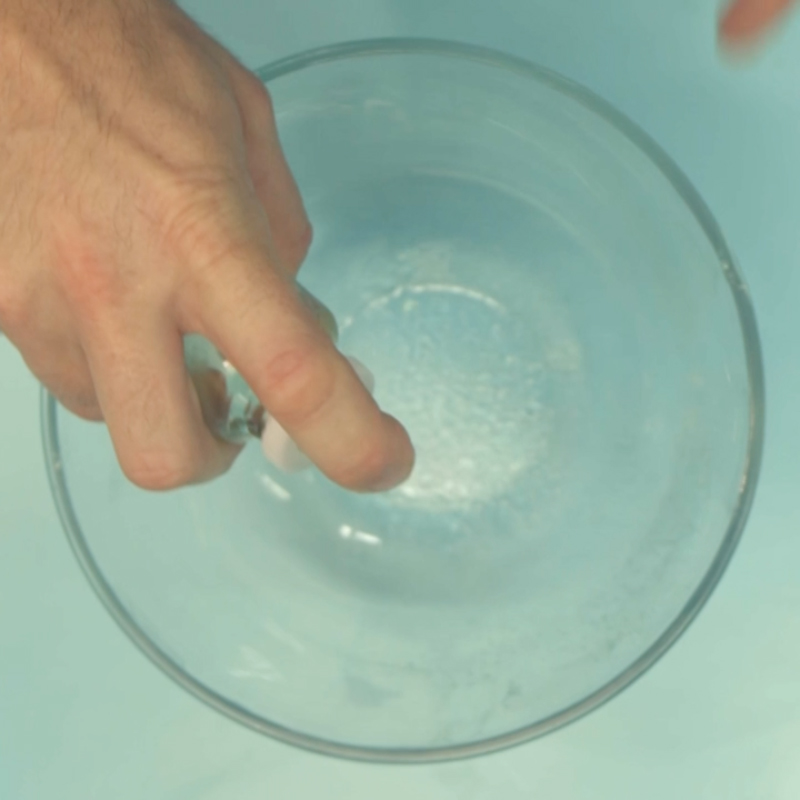  Spray oil into glass bowl