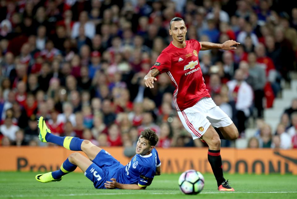  New signing Zlatan Ibrahimovic in action against during Wayne Rooney's testimonial tonight