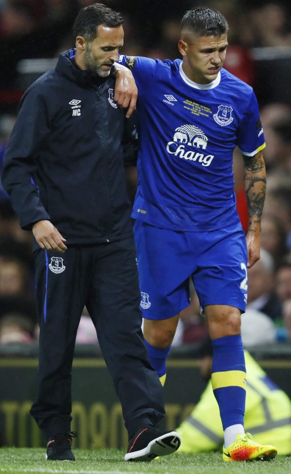 Over and out...unlucky Besic is helped off