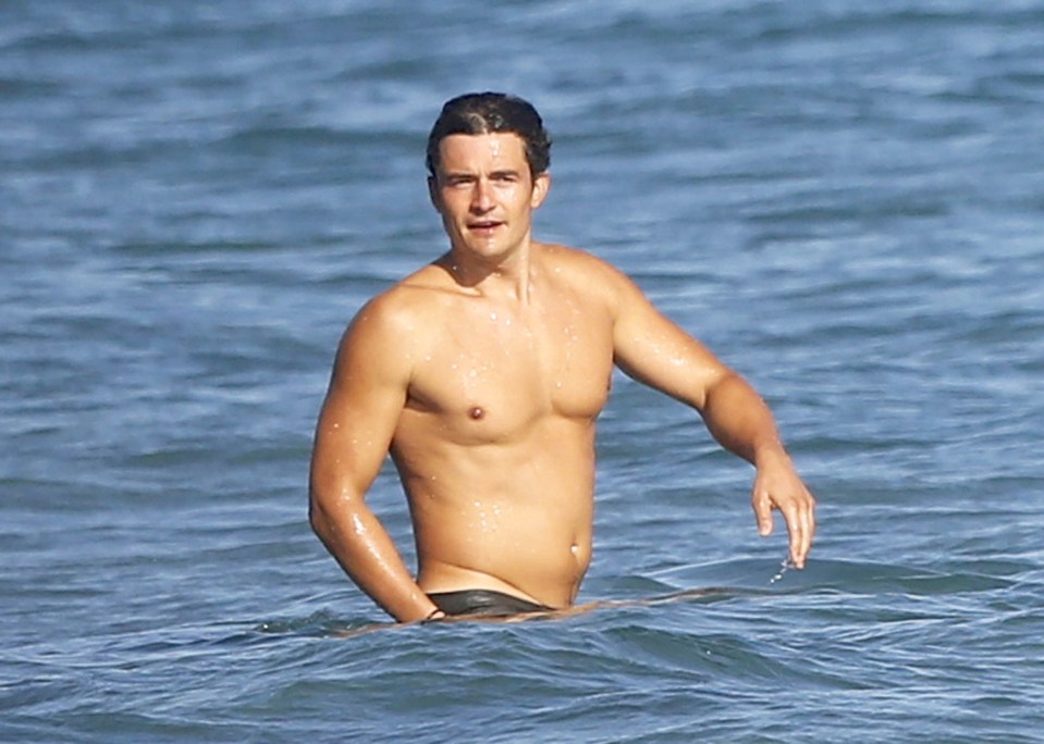  Orlando Bloom has enjoyed a naked paddle boarding trip with Katy Perry in Italy