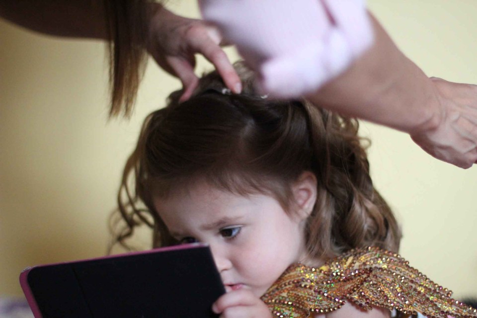  The three-year-old gets ready for a beauty contest