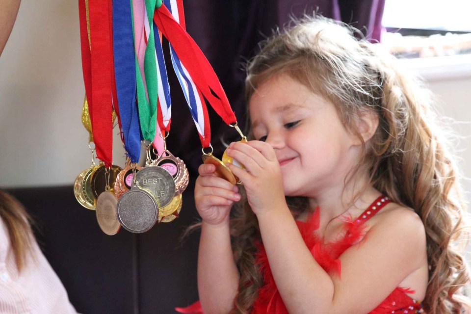  Bella with her many medals