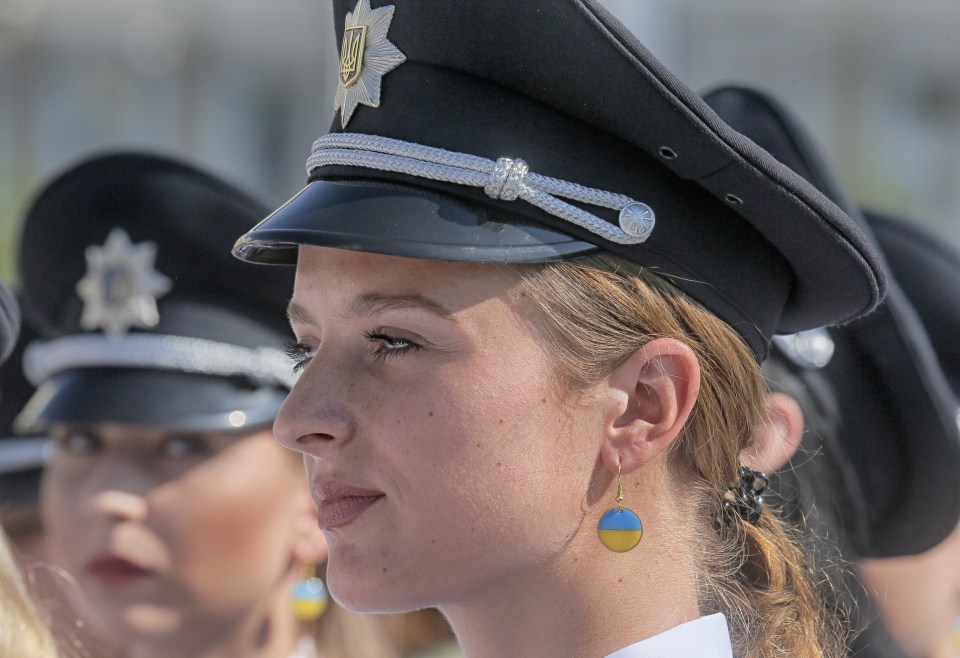 Ukrainian police officers stand on guard during celebration of the National Police Day in Kiev