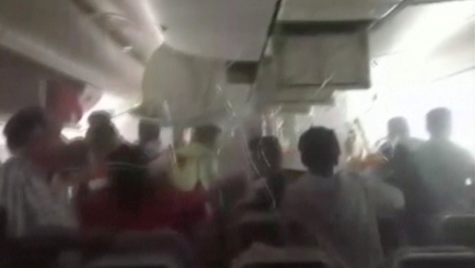 The cabin filled with smoke with oxygen masks falling down