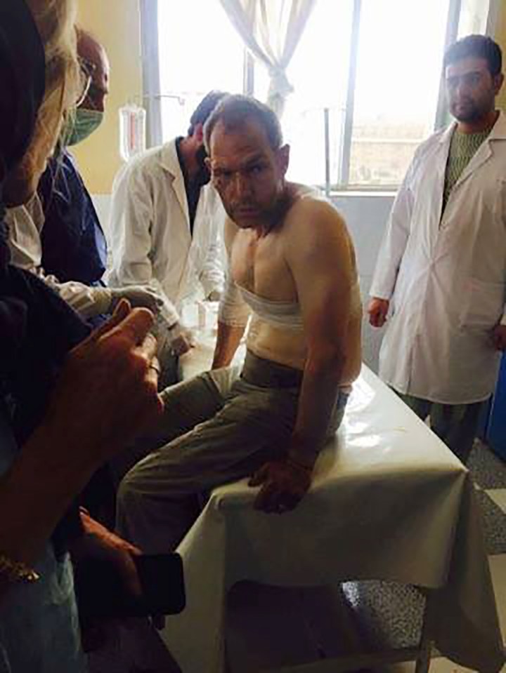  A foreign tourist, wounded during a Taliban militant attack, is treated at a hospital in the western Herat province