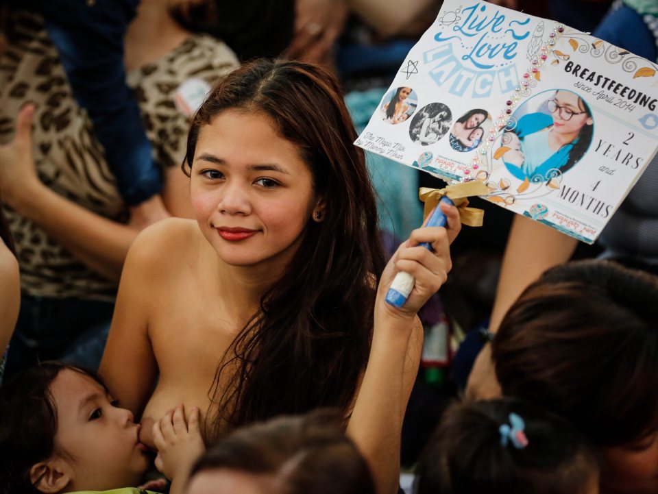  A Manila mum takes part in a mass gathering