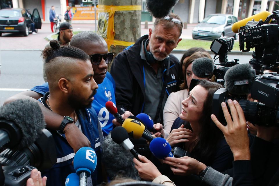  Relatives of victims speak to journalists