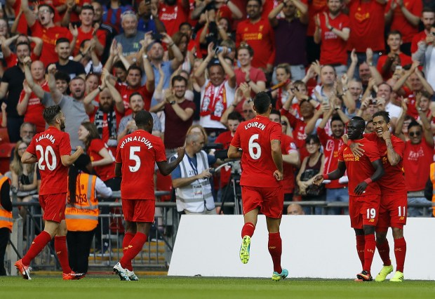 Liverpool celebrate after going 3-0 up against Barcelona