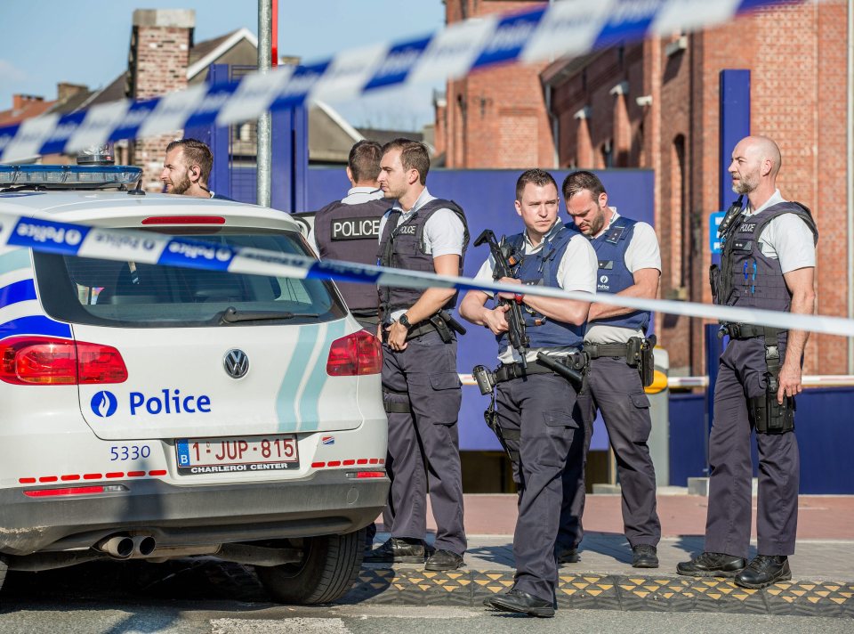  Alert ... Police patrol crime scene after knifeman screaming 'Allahu Akbar' attacked two officers in Charleroi, Belgium