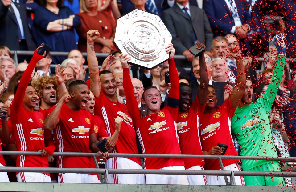 Football Soccer Britain - Leicester City v Manchester United - FA Community Shield - Wembley Stadium - 7/8/16Manchester United's Wayne Rooney celebrates with the trophy after winning the FA Community Shield Reuters / Eddie KeoghLivepicEDITORIAL USE ONLY. No use with unauthorized audio, video, data, fixture lists, club/league logos or "live" services. Online in-match use limited to 45 images, no video emulation. No use in betting, games or single club/league/player publications. Please contact your account representative for further details. TPX IMAGES OF THE DAY