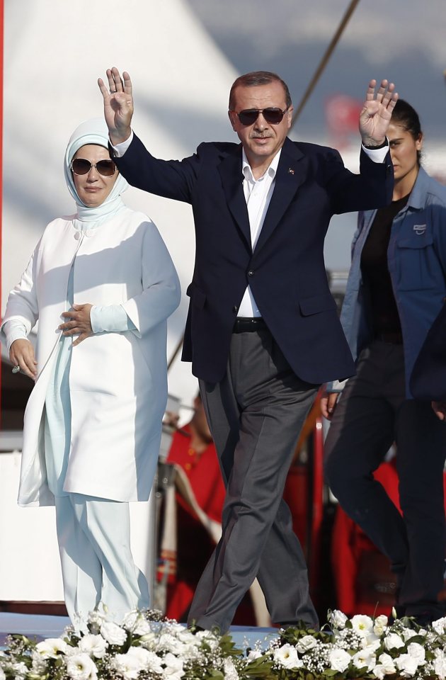  Turkish President Recep Tayyip Erdogan, with his wife Emine Erdogan, vowed to fight against those who had been involved in the attempted coup