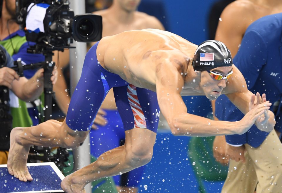  Phelps swam one of his best-ever splits as he took the second leg for USA