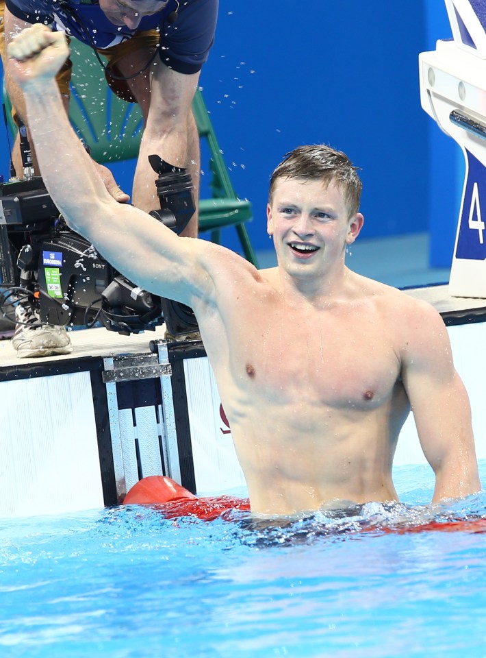  Adam Peaty celebrates his record Breaking gold medal win