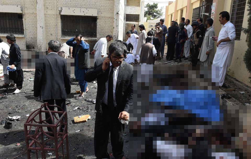  The bodies of those killed in the attack were left lined up next to the hospital