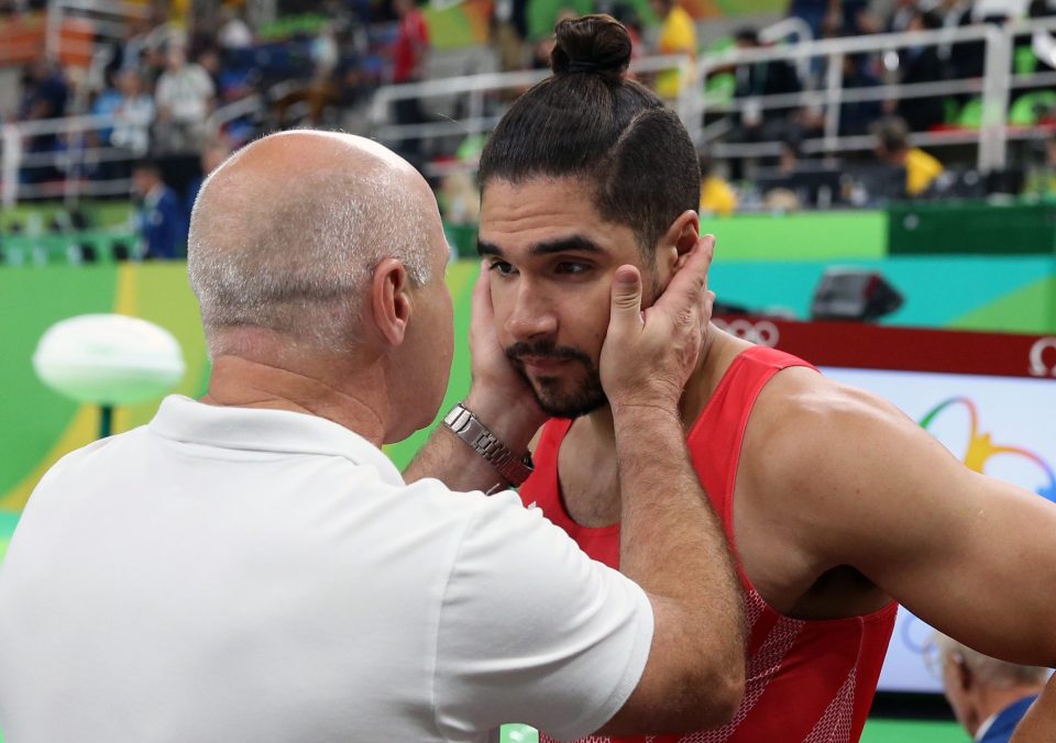  A dejected Louis Smith after he fell off the pommel in the final rotation