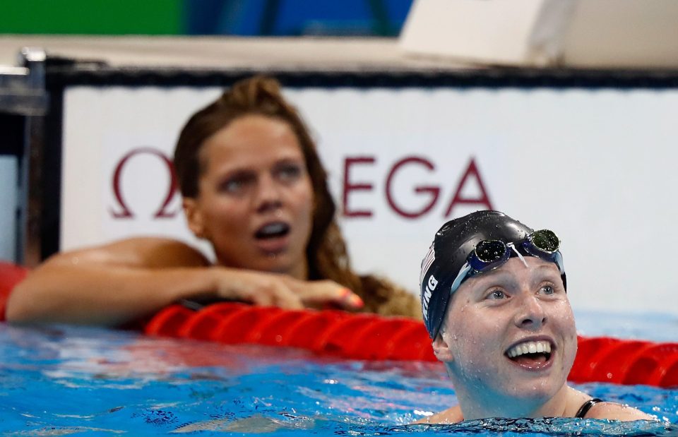  Lilly King celebrates gold in the 100m breaststroke after beating doping rival Yulia Efimova