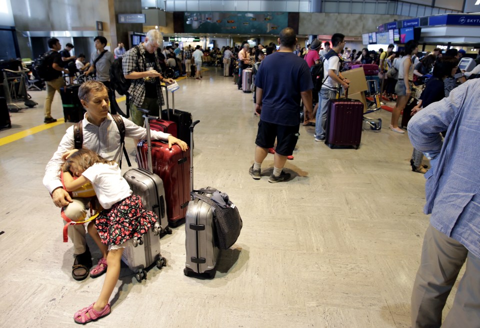 Young children were left trying to sleep as families waited out the horrific delays