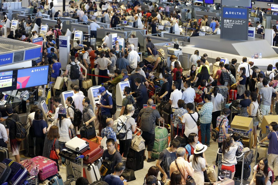 Passengers at Narita airport in Tokyo have been met with continuous delays on Tuesday