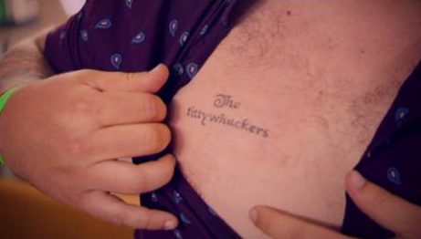 Tom hadn't gone topless since having this horrendous tattoo