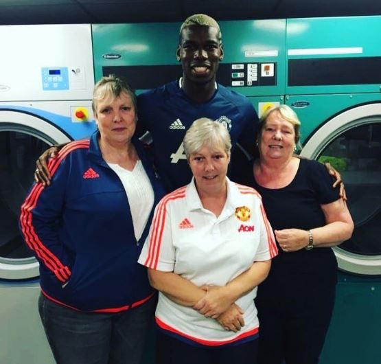 A picture of Pogba and the laundry team at Manchester United was tweeted before his signing was announced 