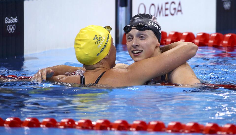  Katie Ledecky is congratulated by Sarah Sjostrom after winning gold