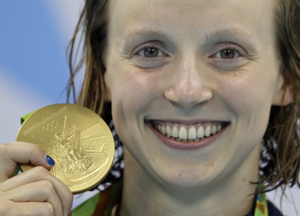  Katie Ledecky shows off her second Olympic gold medal of the games