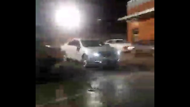 The white car was shot at after it hit the protester, named locally as Jacoby Thomas